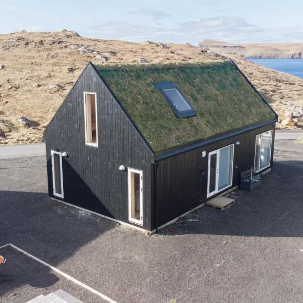 Vacation Home / Scenic Nature / Sandoy / Beach, hotel in Sandur