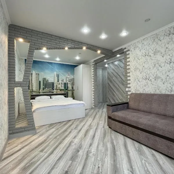 Квартира бизнес-класса с белым постельным, hotel en Petropavlovsk