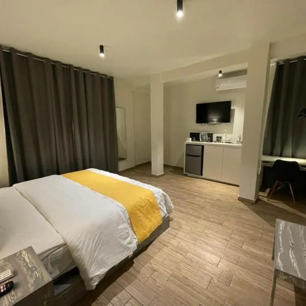 Capital Suites, viešbutis mieste Zanjón