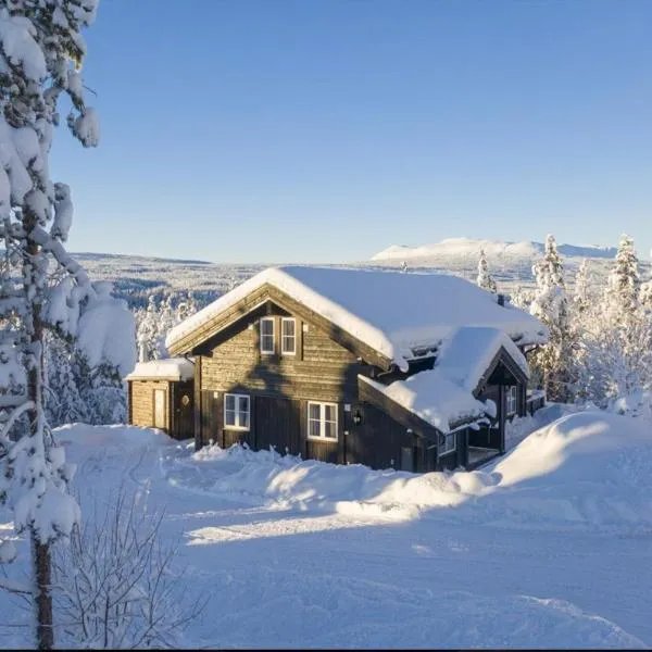 Cabin with sauna in Trysil, hotel in Østby