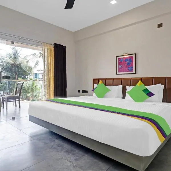 Treebo Trend Grand Vistara Airport Suites, hotel in Kāladi