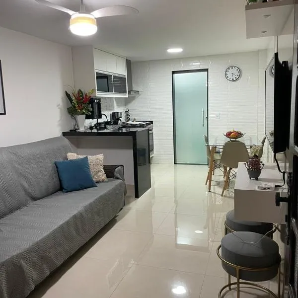 Apartamento moderno e super confortável localizado a alguns passos da Praia Grande