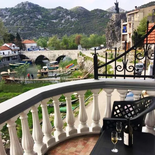 Apartments FLORA and boat cruising, hotel in Virpazar