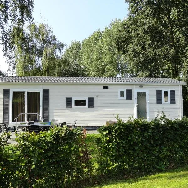 Stellechalets op Vakantiepark Stelleplas - Heinkenszand, hôtel à Heinkensand