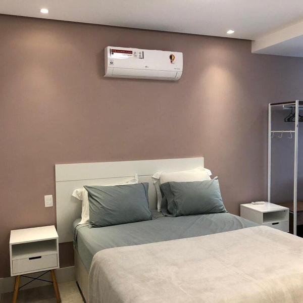 Novíssimo 2 quartos na quadra da praia - Foto 4