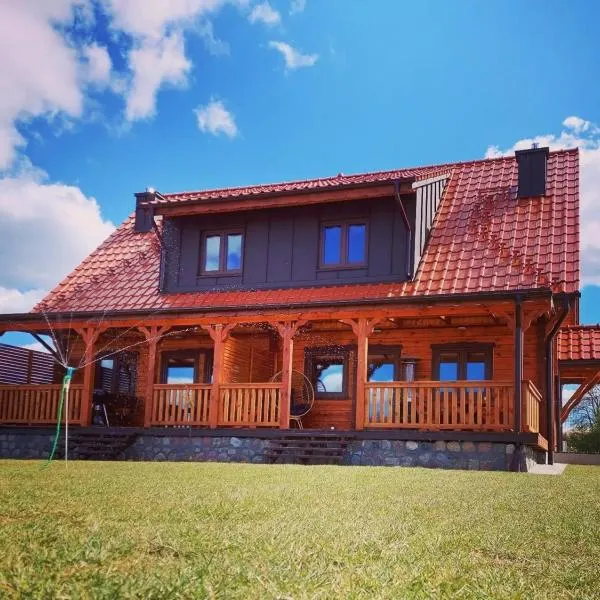 Sielski Spokój Dom z bali Apartamenty całoroczne, hotel v destinaci Gietrzwald