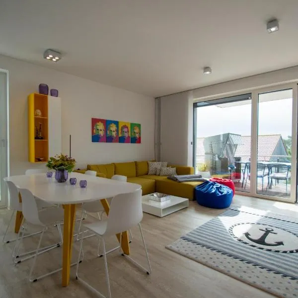 Albert-INN-Glowe - barrierefrei & 3 Schlafzimmer & Strandkorb-saisonal & Sauna im Haus & Fahrräder, Bollerwagen & E-Ladesäule in der Anlage, hotelli kohteessa Glowe
