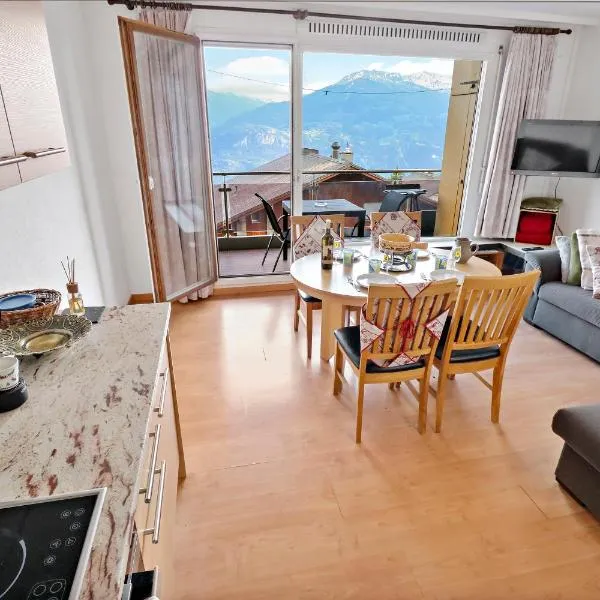 Appartement chaleureux avec une magnifique vue, hotel en Crans-Montana