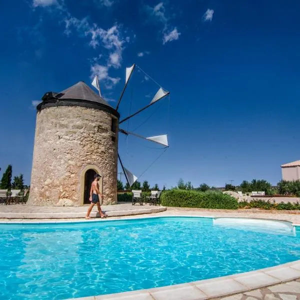The Windmill Resort, hótel í Mitáta
