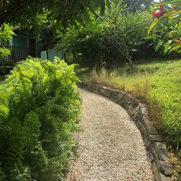 Charmant bungalow avec piscine, hotel in Saint-Joseph