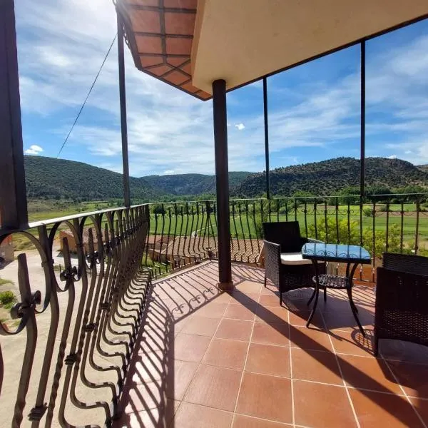 Apartamentos El Pozo, hotel in Royuela