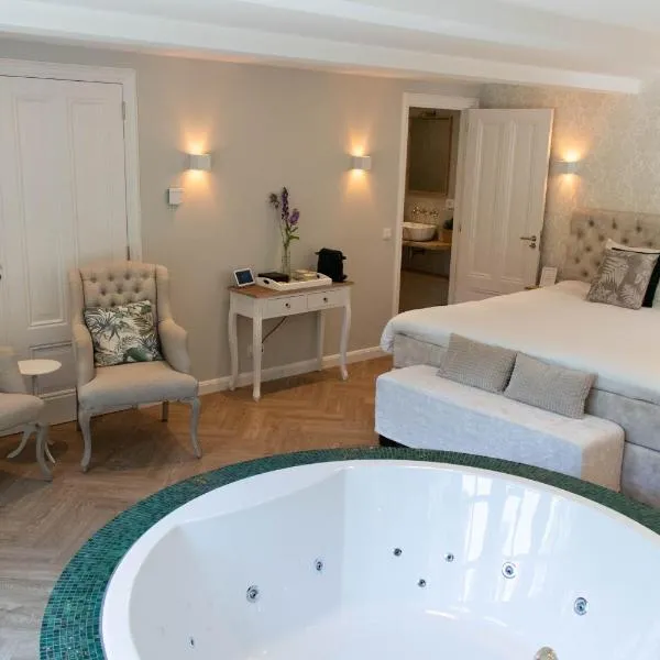 Guesthouse "Mirabelle" met indoor jacuzzi, sauna & airco, hotell i Gilze