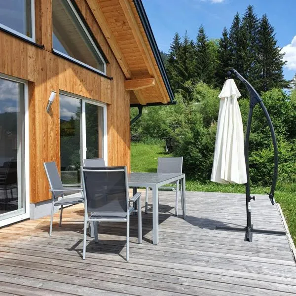 Ferienhäuser Seetraum Premium Card inklusive, hotel in Weissensee