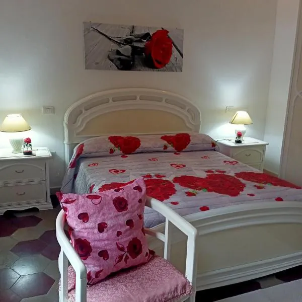 Appartamento vacanze Le rose، فندق في بوسا