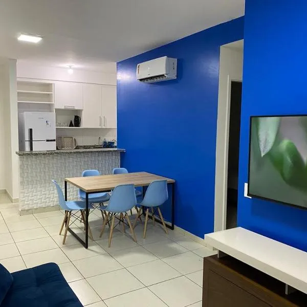 Guarujá condomínio Villa Di fiori AP jasmim, hotel in Guarujá