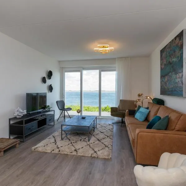 Vakantiewoning aan het strand - met tuin en terras - Vista Maris -Nr 18, ξενοδοχείο σε Sint Annaland