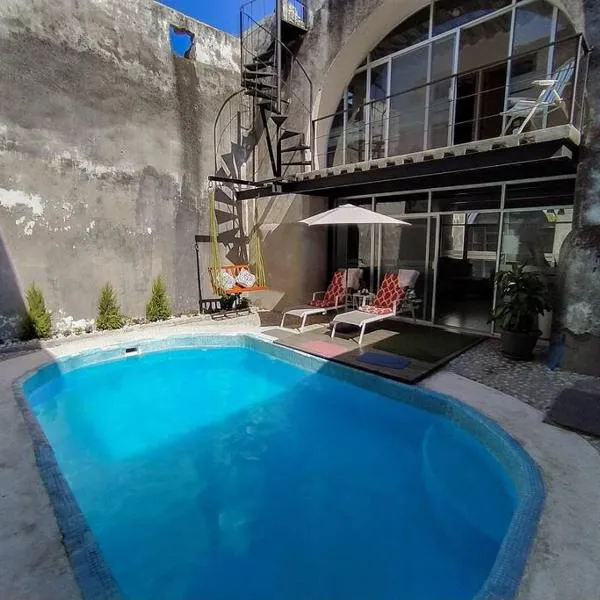 Casa con alberca dentro de ex-hacienda en Atlixco โรงแรมในอัทลิซโก
