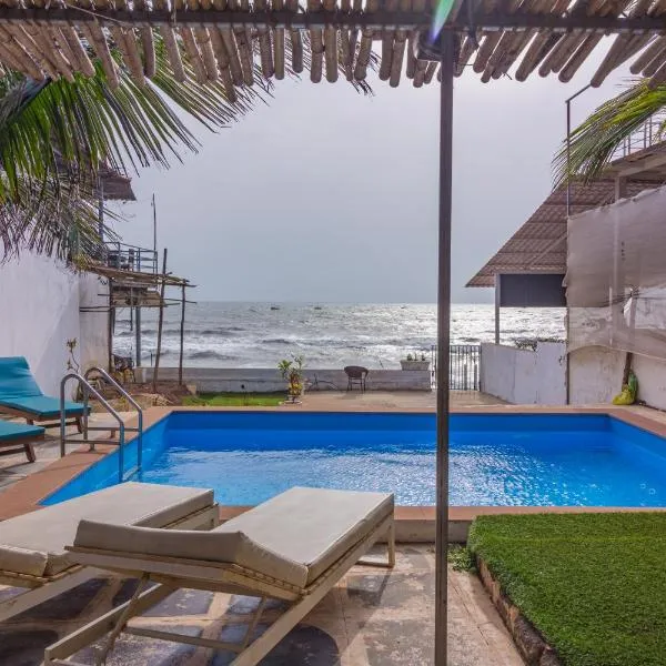 Beachfront pool villa Myconos, hotel in Anjuna