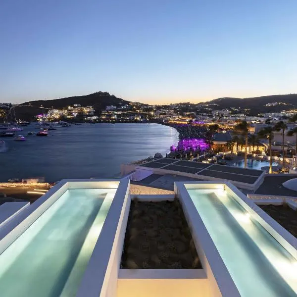 CUBIC Mykonos Seafront Design Suites, хотел в Орнос