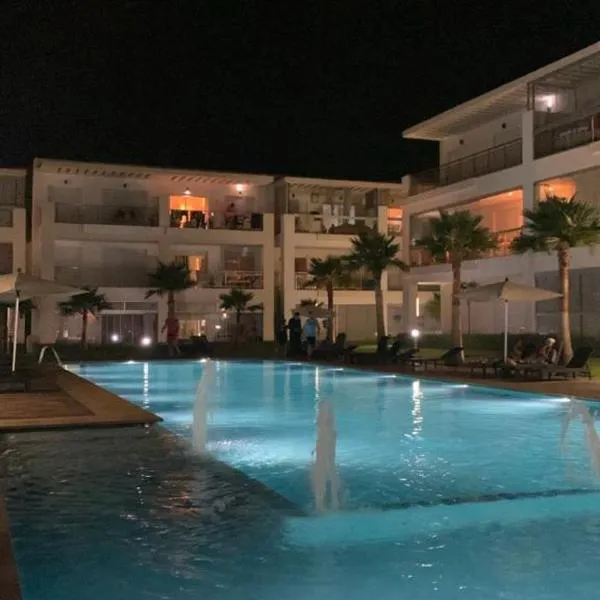 Appartement à louer dans une résidence balnéaire 3 piscines - RAMOFLORES Sidi Rahal, hotel a Dar Hamida