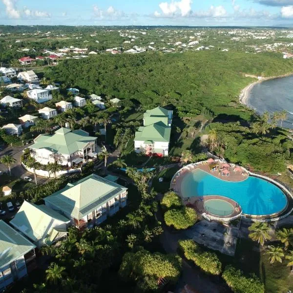 Guadeloupe- Saint-François- Résidence Anse des Rochers - Appartement quart de villa étage - vue mer- 4 personnes - Lit bébé sur demande - Citerne et wifi privés -Animaux ok-Accès plage direct -Apnée bien-être expérience sur demande avec instructeur AIDA -, hotel v destinaci Saint-François