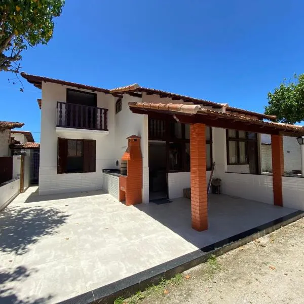 Casa Aconchegante à Beira Mar com estacionamento.