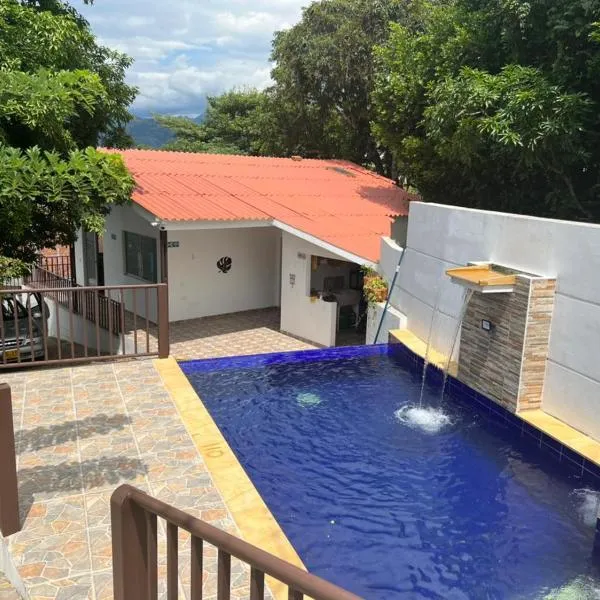 Finca acogedora en Villeta con piscina privada, hotel en Villeta
