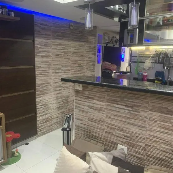 Espaço Mahina - Unidade Tupy - Apto para Temporada Praia Grande na Tupy 01, hotel i Praia Grande