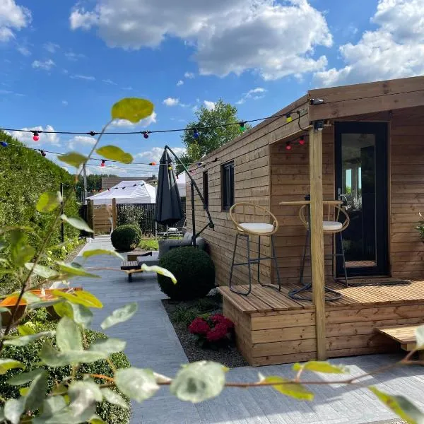 Roulotte du puits avec jacuzzi et sauna privatif โรงแรมในHavinnes
