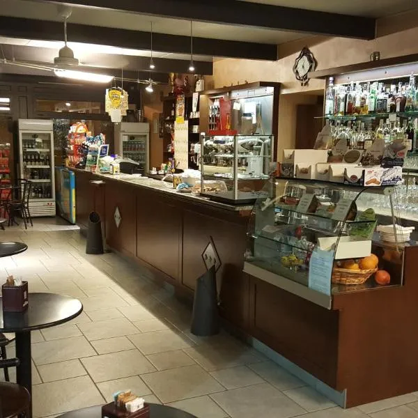 Cafe del peso, hotell i Cavour