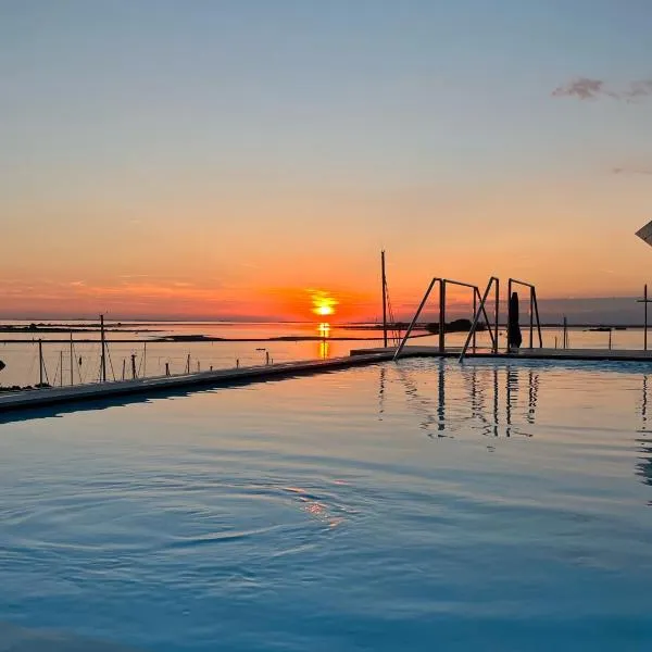 Laguna Faro Suites - Adults Only & Free Beach, готель у місті Аквілея
