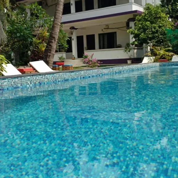 Heaven Goa Guesthouse, hotel di Benaulim