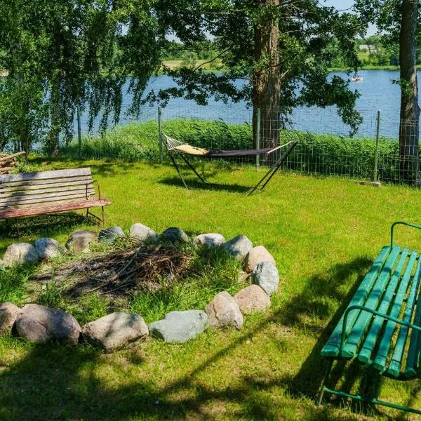 Domek letniskowy nad jeziorem, viešbutis mieste Łąck
