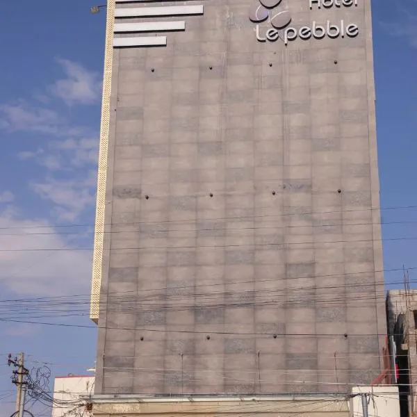 THE PEBBLE Boutique Hotel, hotel in Tiruppūr