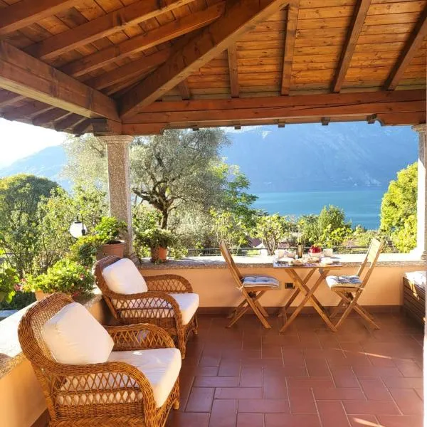 Casa Intignano - Camera con bagno e portico vista lago – hotel w mieście Tremezzo