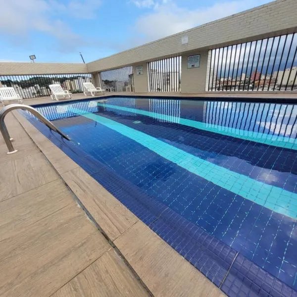 Flat Completo Novo a 350m da praia com piscina, hotel em São Vicente