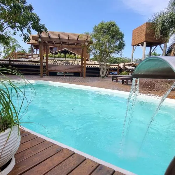 Arte da Tribo Hostel & Camping, hotel in Praia do Rosa