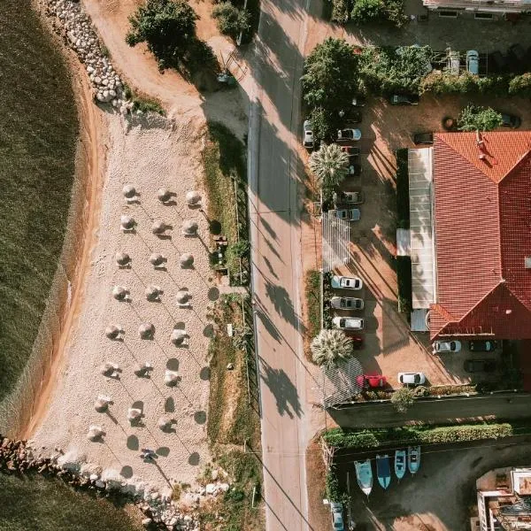 Calma Beach Hotel, ξενοδοχείο στον Σταυρό