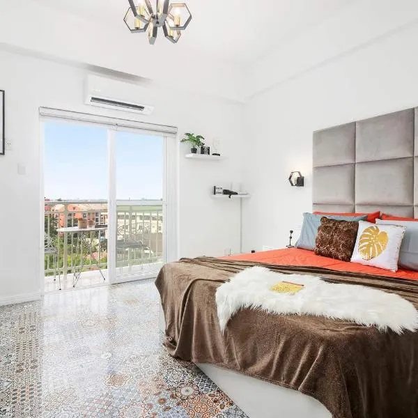 Hyllia by J&J Homes At Amani Grand Resort Residences Near Airport, hotel in Pusok