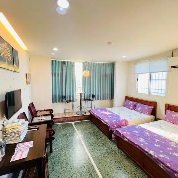 Xingang Homestay, hotel di Xingang