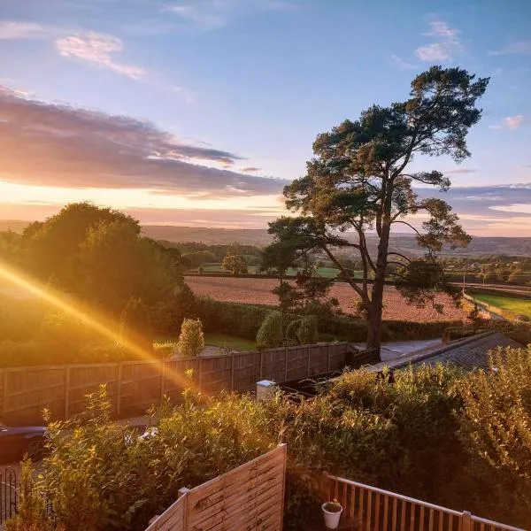 Our beautiful large Suite room with a Double bath with Shower ensuite - It has a full Kitchen boasting stunning views over the Axe Valley - Only 3 miles from Lyme Regis, River Cottage HQ & Charmouth - Comes with free private parking, hotell sihtkohas Axminster