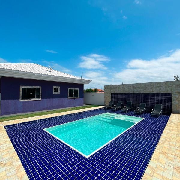 casa de praia com piscina e hidromassagem