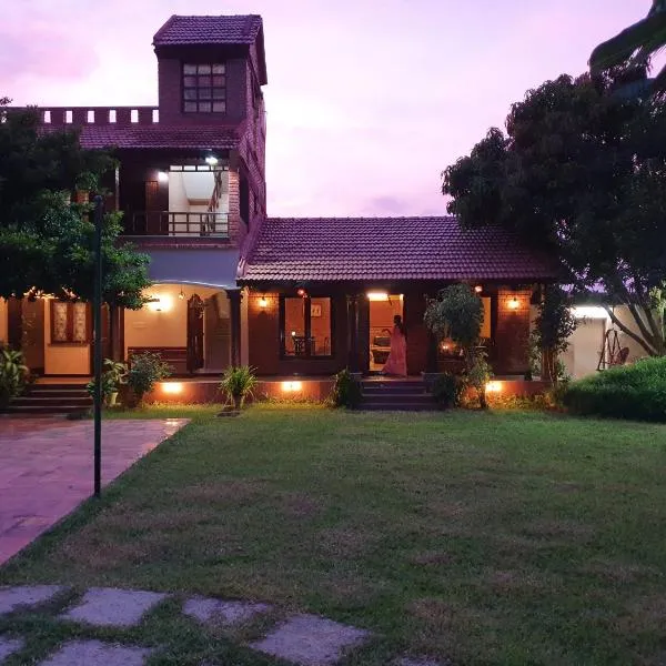 Anchorage - Mesmerizing villa with lawn, BB court, отель в Махабалипураме