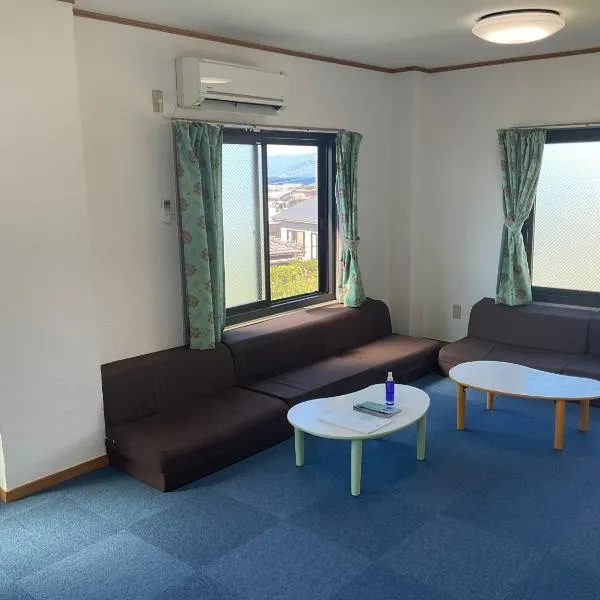 ゲストハウスKOIZUMI, hotel v destinaci Oshima