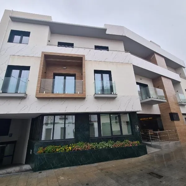 OIKOS APARTAMENTOS TURÍSTICOS, hotel Monesterióban