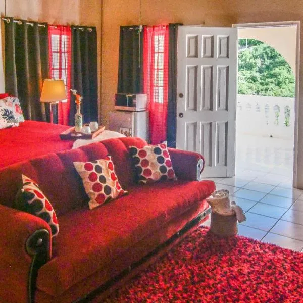 876 JA Oasis & Homestay - by Kingston Airport, hotell i Kingston