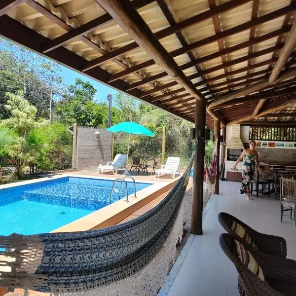 Linda casa 4/4 com piscina na Praia do Forte., hotel em Mata de São João