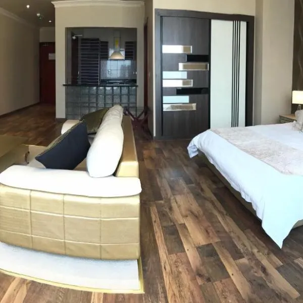 Wakra Inn Hotel Apartments: Museyid şehrinde bir otel