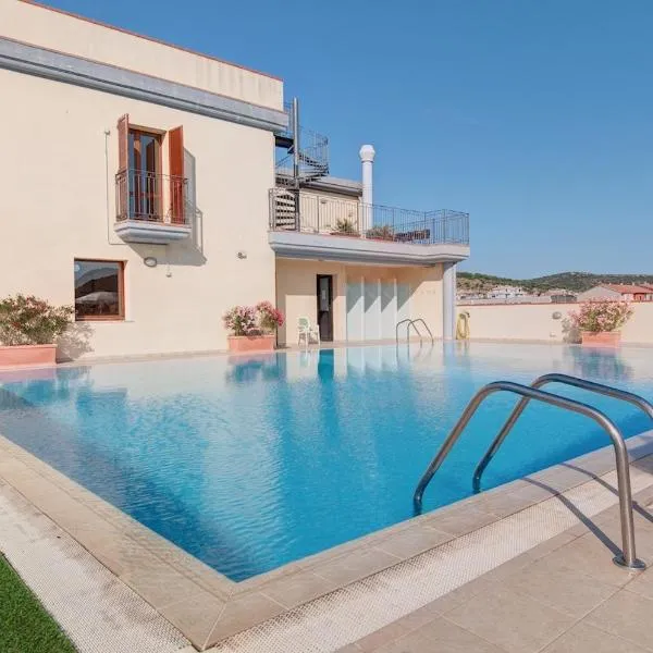 Apartments in residence with swimming pool in Villasimius, hotel in Villasimius