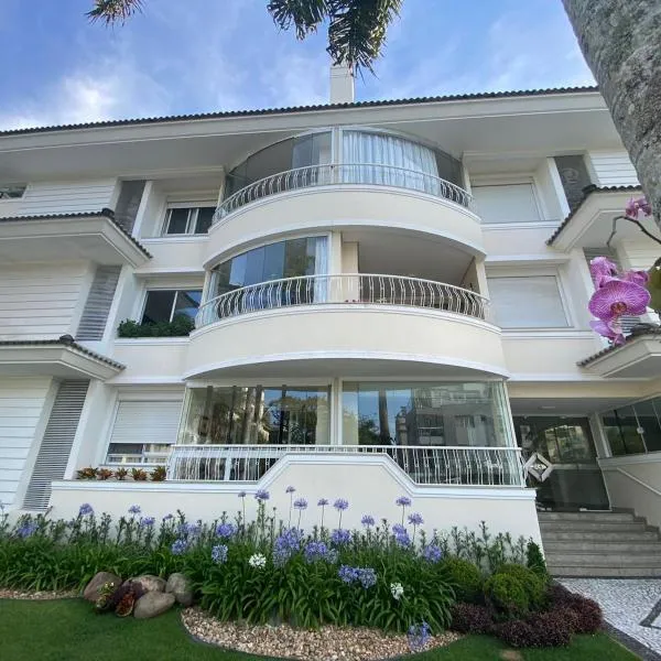 lindo apartamento em jurerê internacional, hotel em Florianópolis